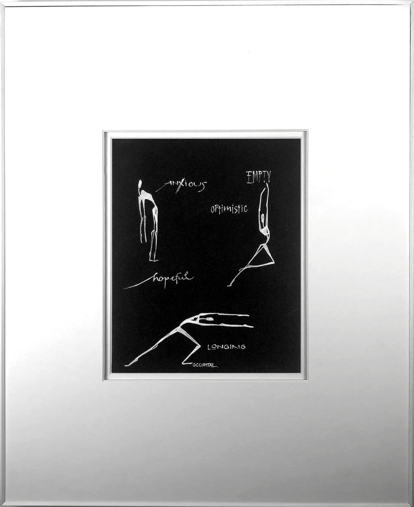 Framed artwork with black and white line drawings on a black background